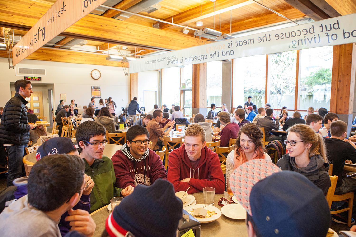 Students socialize and eat in Gwinn Commons dining hall